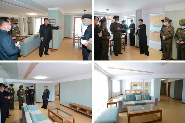 김정은 북한 국무위원장이 완공된 평양 보통강변 다락식주택구를 돌아보고 있다. 사진=트위터